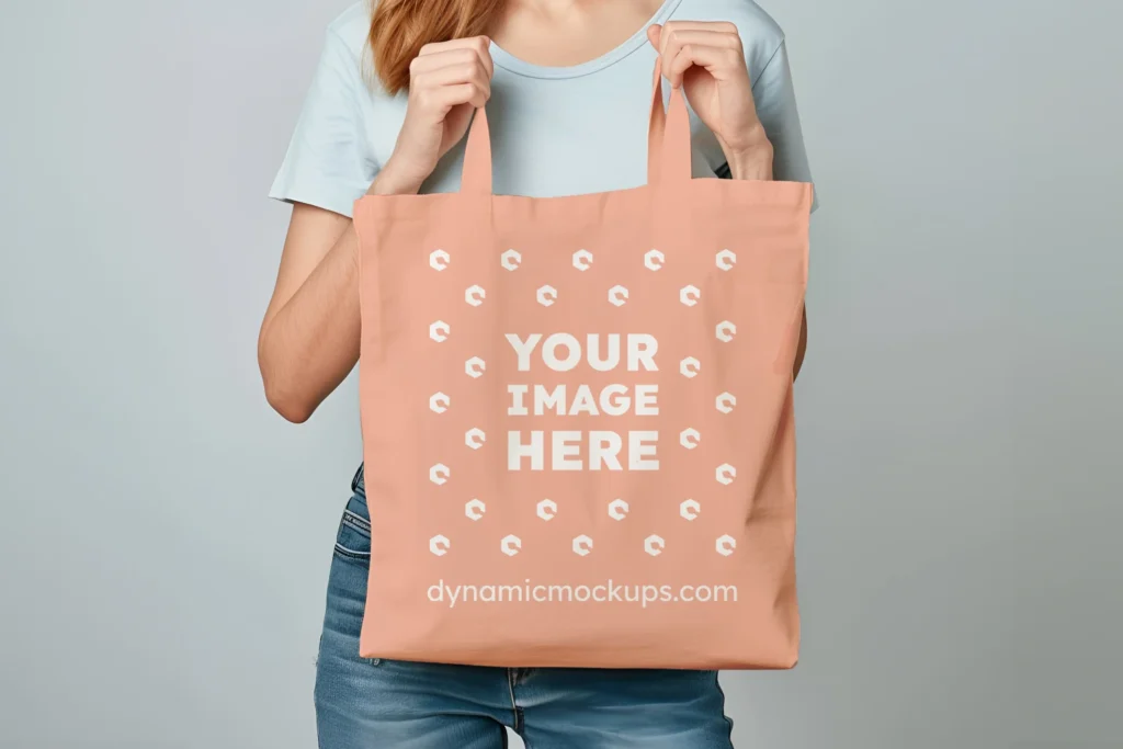 Woman Holding Peach Tote Bag Mockup Front View Template