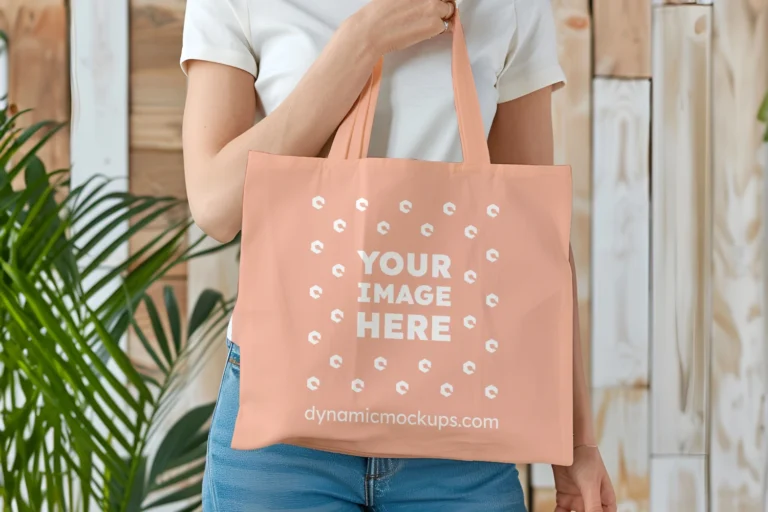 Woman Holding Peach Tote Bag Mockup Front View Template