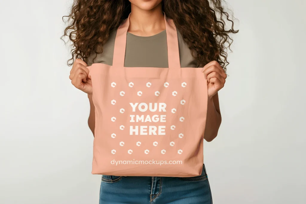 Woman Holding Peach Tote Bag Mockup Front View Template