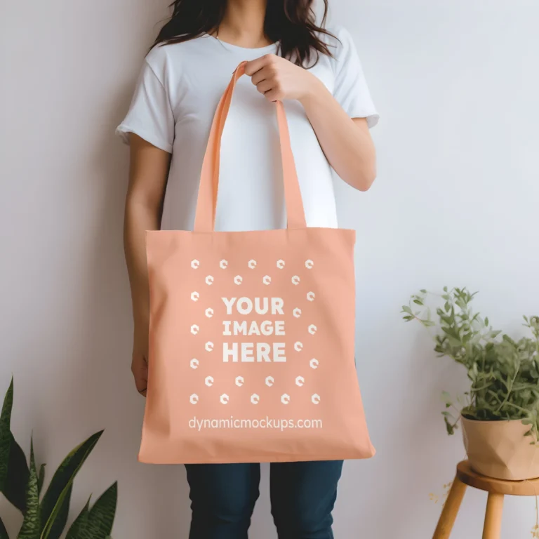 Woman Holding Peach Tote Bag Mockup Front View Template