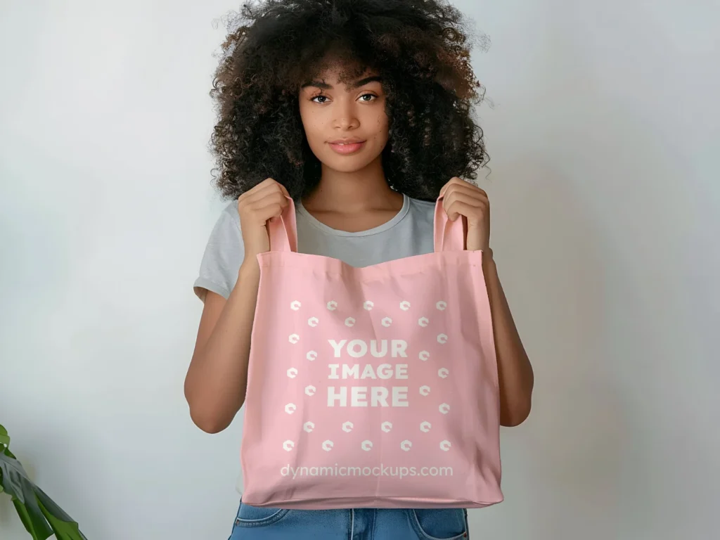 Woman Holding Pink Tote Bag Mockup Front View Template