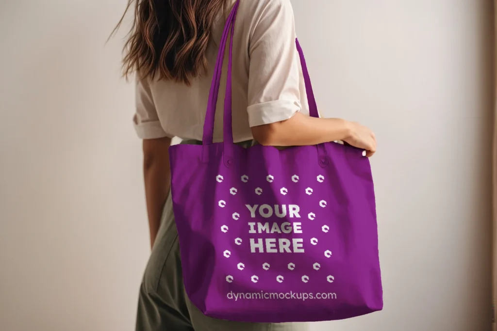 Woman Holding Purple Tote Bag Mockup Side View Template