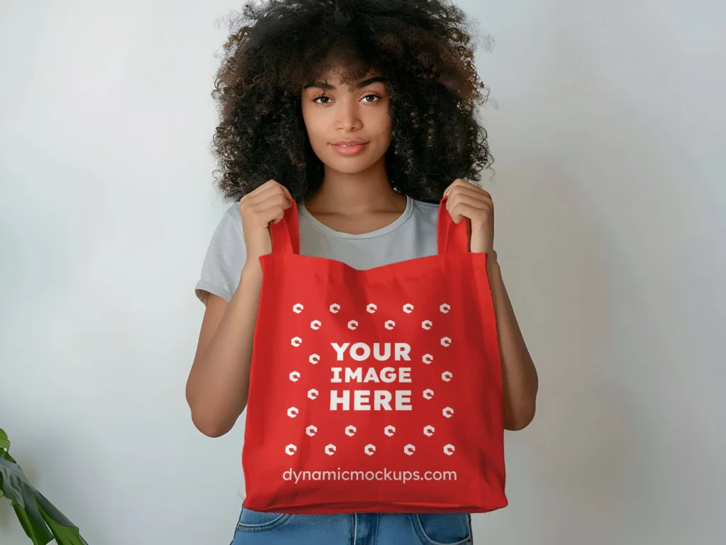 Woman Holding Red Tote Bag Mockup Front View Template