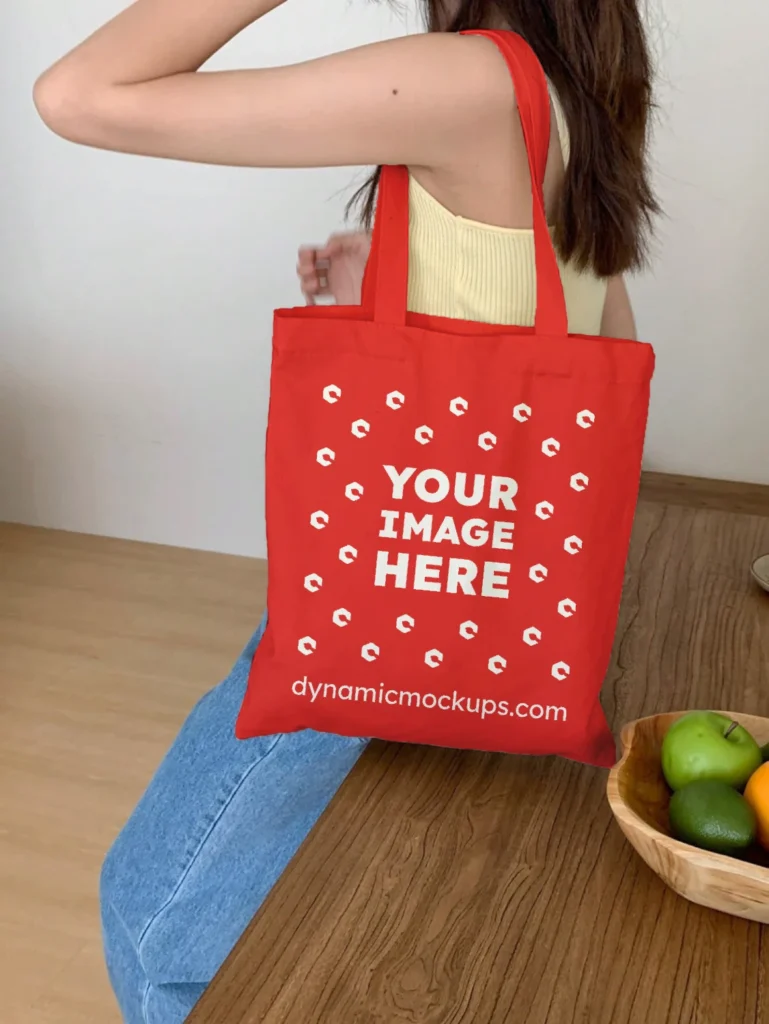 Woman Holding Red Tote Bag Mockup Side View Template