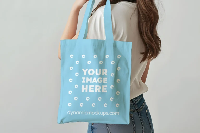 Woman Holding Sky Blue Tote Bag Mockup Side View Template