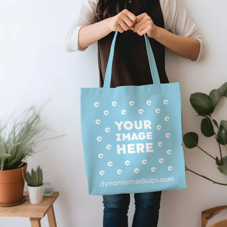 Woman Holding Sky Blue Tote Bag Mockup Front View Template