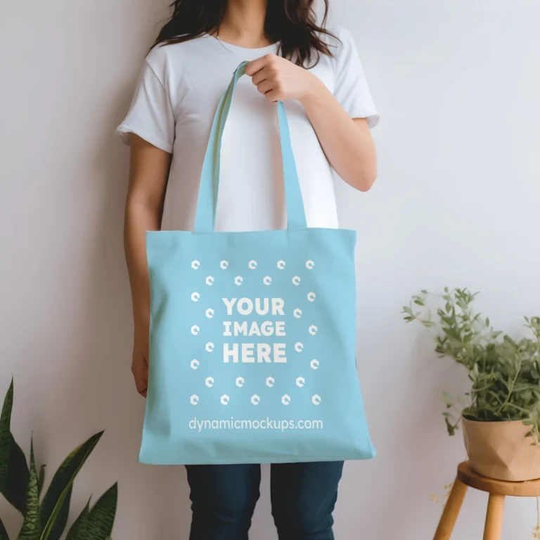 Woman Holding Sky Blue Tote Bag Mockup Front View Template