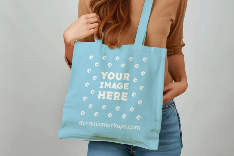 Woman Holding Sky Blue Tote Bag Mockup Front View Template