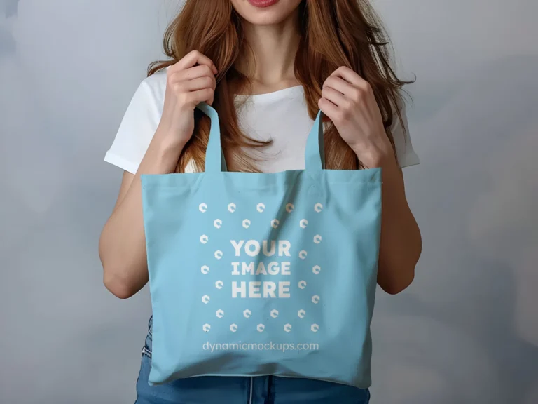 Woman Holding Sky Blue Tote Bag Mockup Front View Template