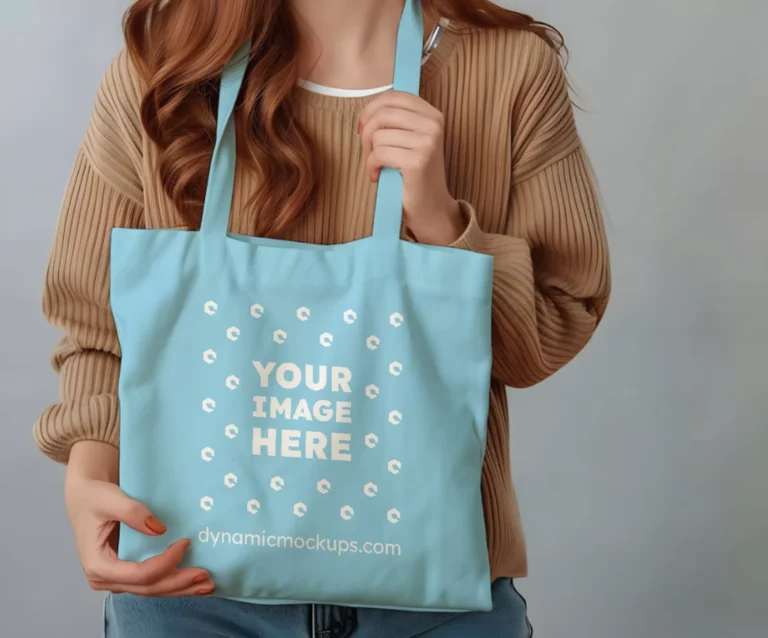 Woman Holding Sky Blue Tote Bag Mockup Front View Template