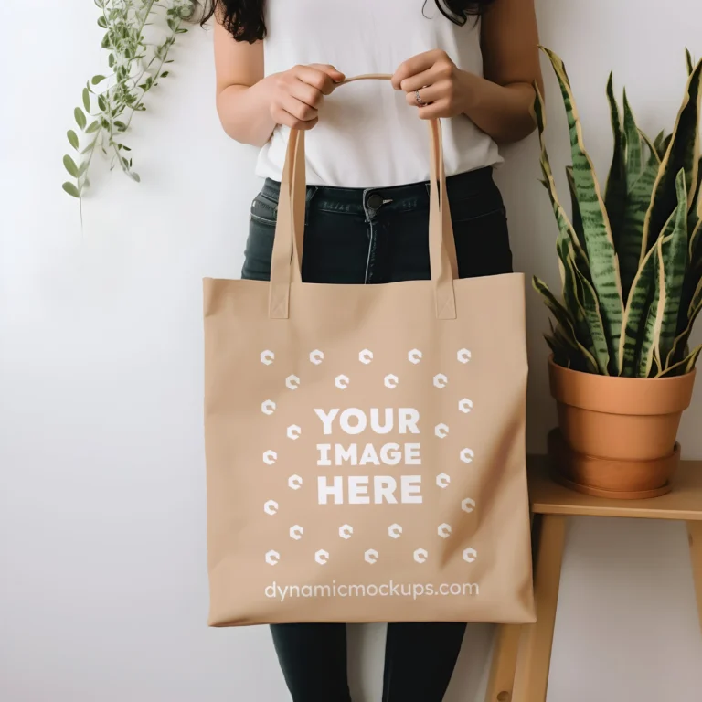 Woman Holding Tan Tote Bag Mockup Front View Template