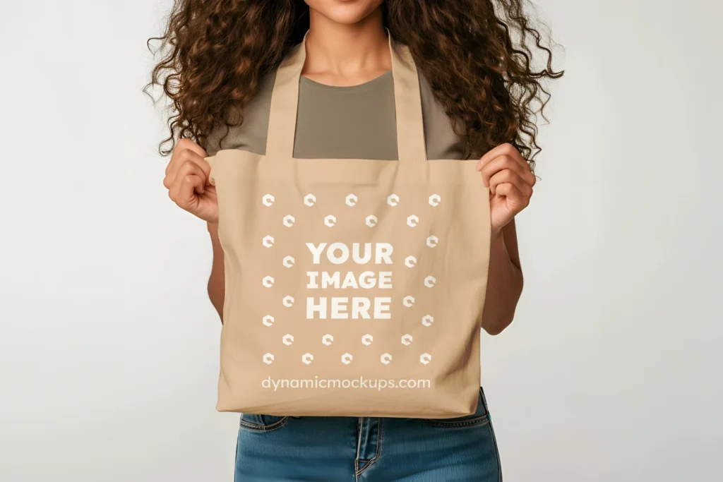 Woman Holding Tan Tote Bag Mockup Front View Template