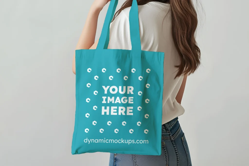 Woman Holding Teal Tote Bag Mockup Side View Template