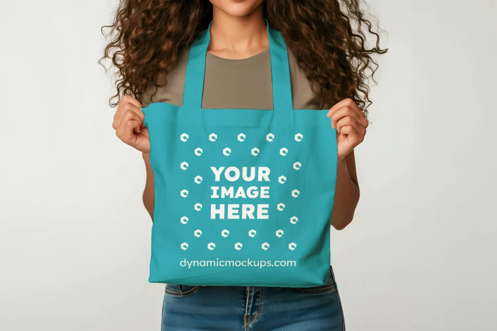 Woman Holding Teal Tote Bag Mockup Front View Template