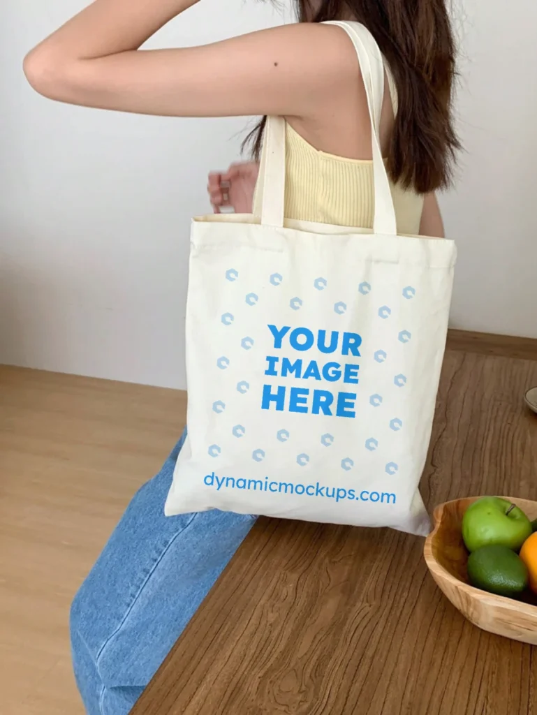 Woman Holding White Tote Bag Mockup Side View Template