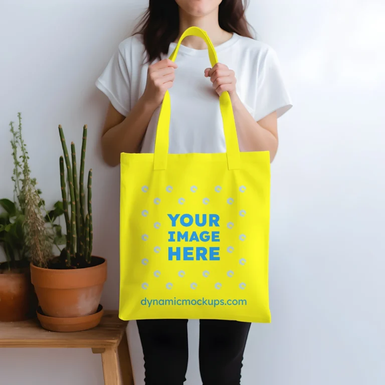 Woman Holding Yellow Tote Bag Mockup Front View Template