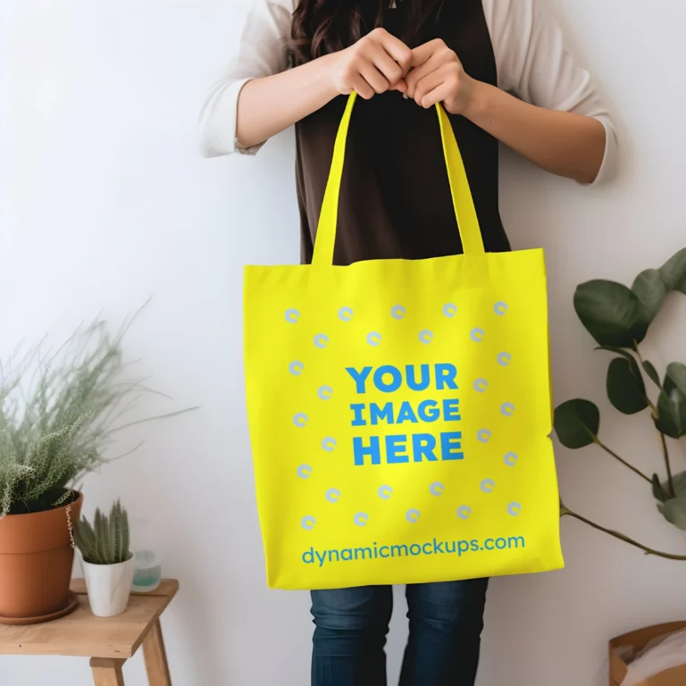 Woman Holding Yellow Tote Bag Mockup Front View Template