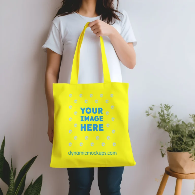 Woman Holding Yellow Tote Bag Mockup Front View Template