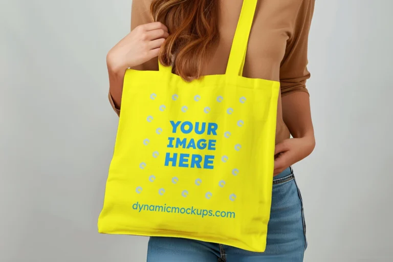 Woman Holding Yellow Tote Bag Mockup Front View Template