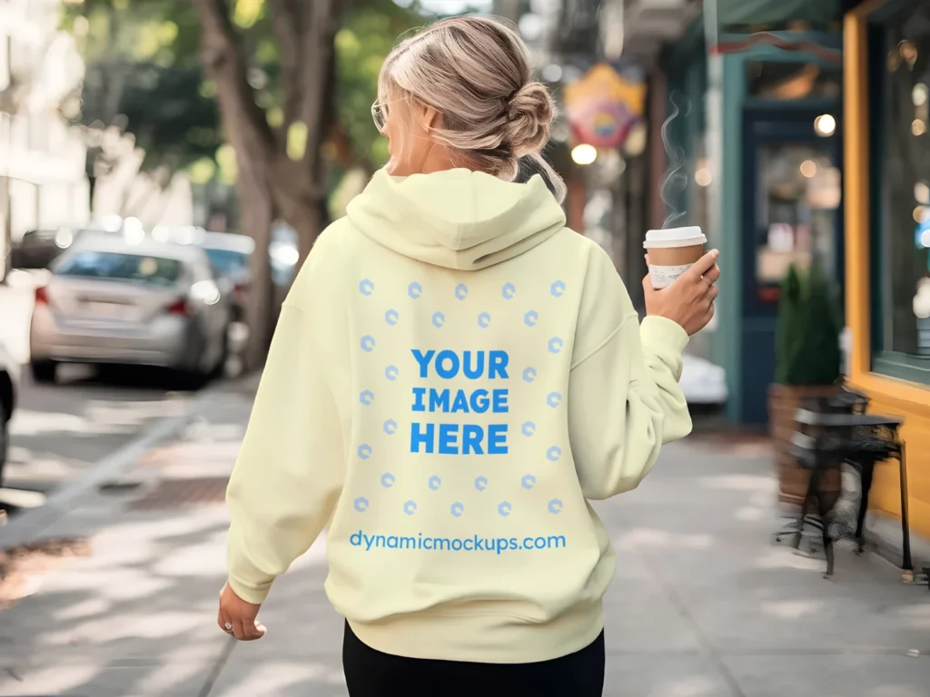 Woman Wearing Cream Hoodie Mockup Back View Template