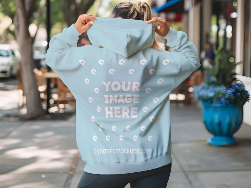 Woman Wearing Light Blue Hoodie Mockup Back View Template