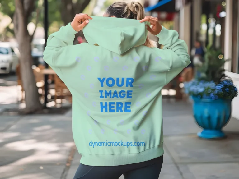 Woman Wearing Mint Hoodie Mockup Back View Template