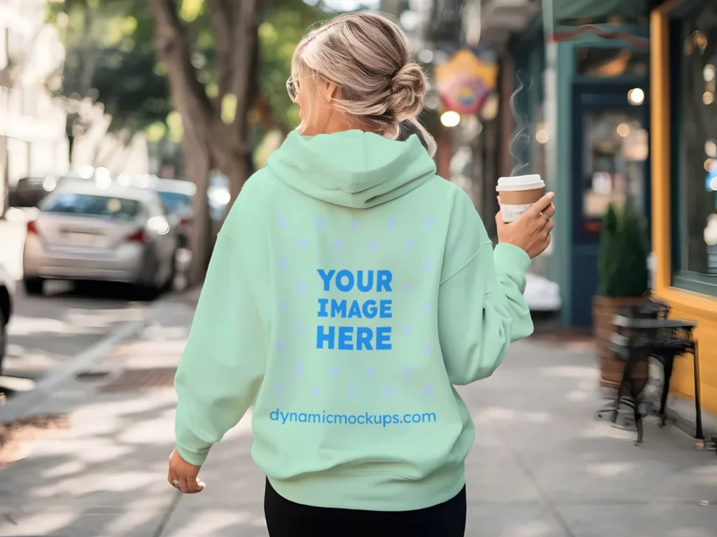 Woman Wearing Mint Hoodie Mockup Back View Template