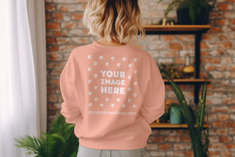 Woman Wearing Peach Sweatshirt Mockup Back View Template