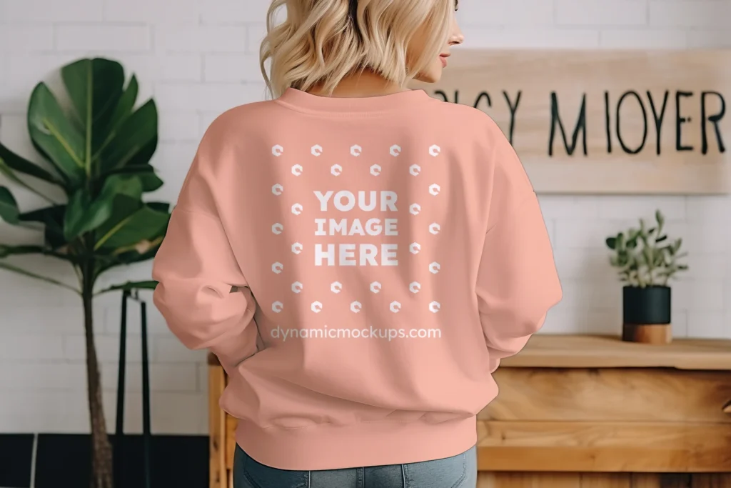 Woman Wearing Peach Sweatshirt Mockup Back View Template