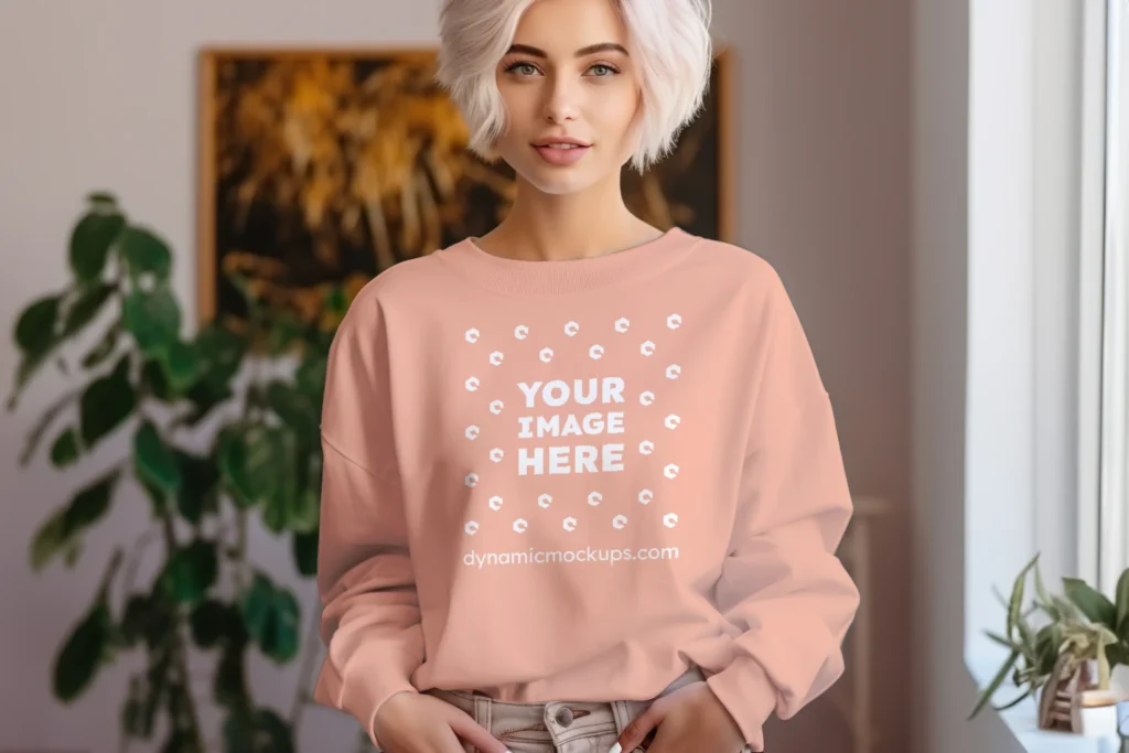 Woman Wearing Peach Sweatshirt Mockup Front View Template