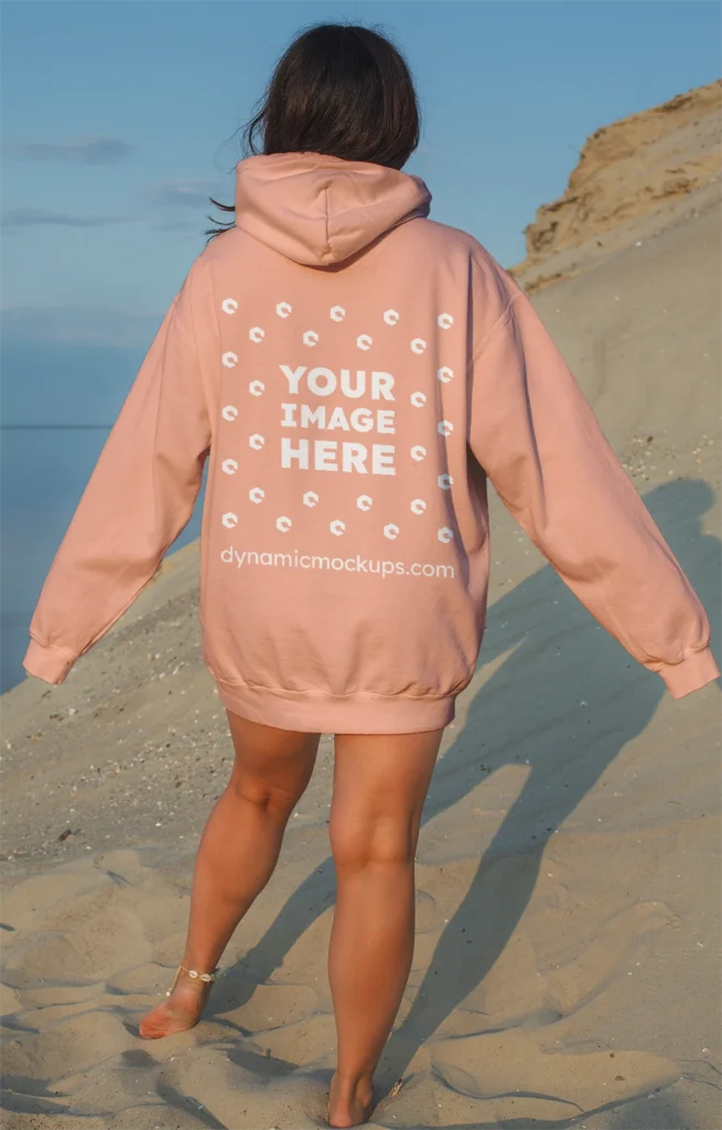 Woman Wearing Peach Hoodie Mockup Back View Template