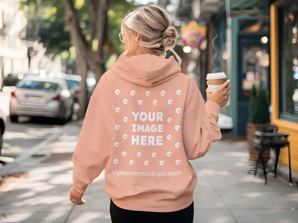 Woman Wearing Peach Hoodie Mockup Back View Template