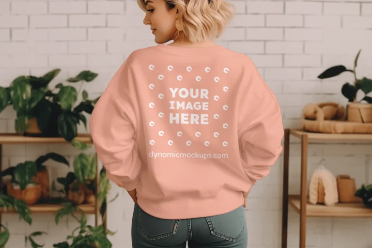 Woman Wearing Peach Sweatshirt Mockup Back View Template