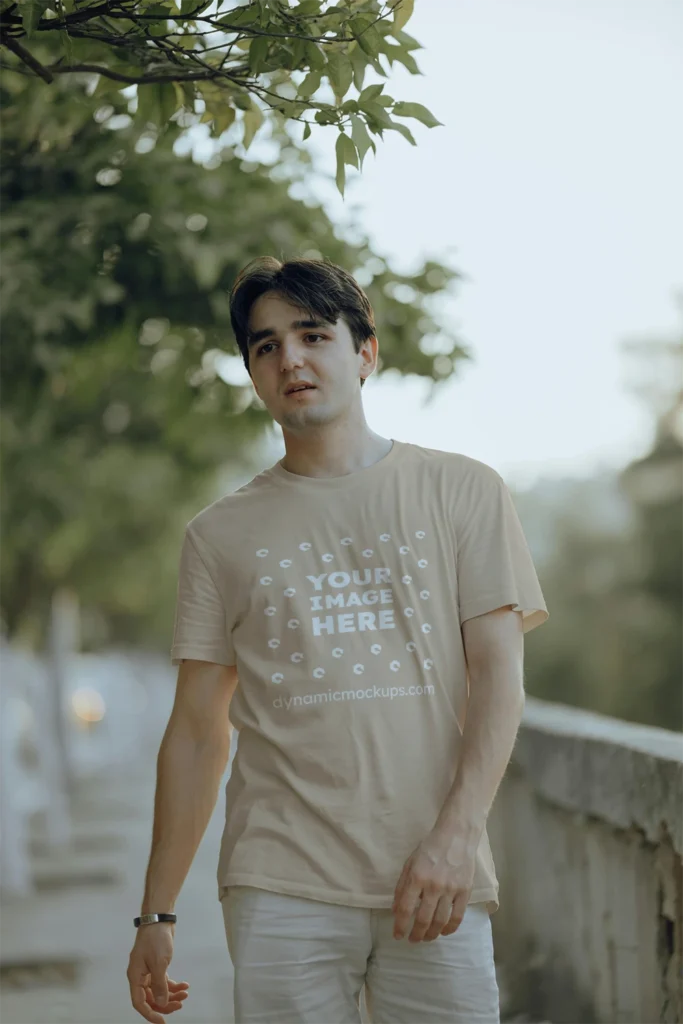 Man Wearing Beige T-shirt Mockup Front View Template