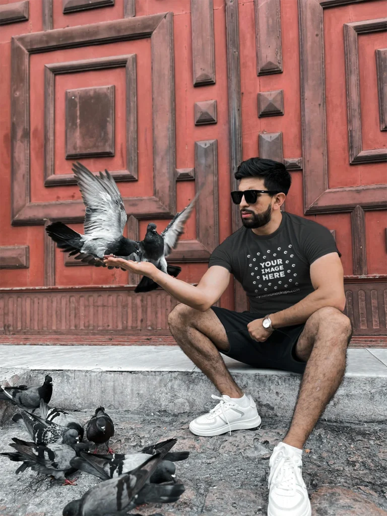 Man Wearing Black T-shirt Mockup Front View Template