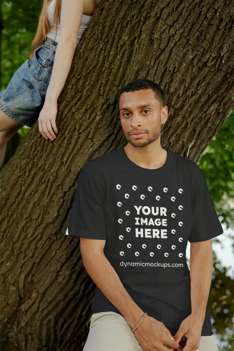 Man Wearing Black T-shirt Mockup Front View Template