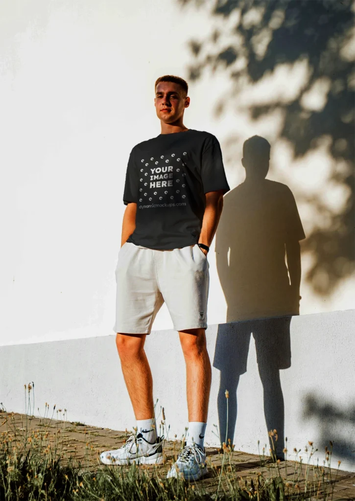 Man Wearing Black T-shirt Mockup Front View Template