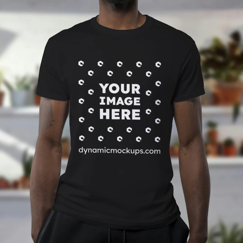 Man Wearing Black T-shirt Mockup Front View Template