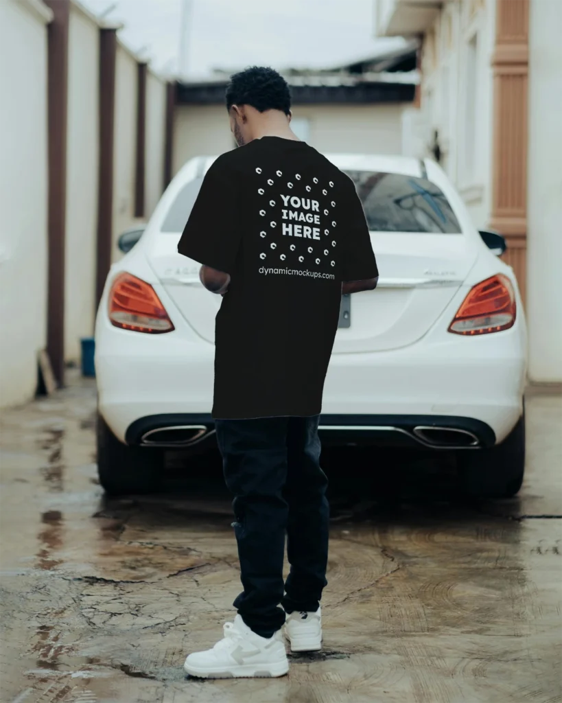 Man Wearing Black T-shirt Mockup Back View Template