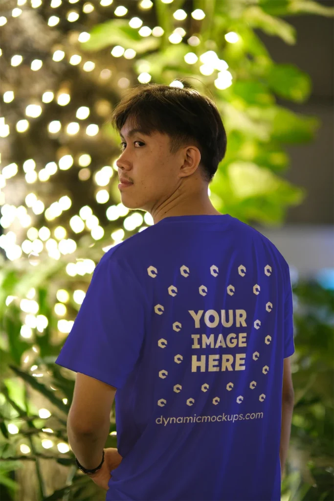 Man Wearing Blue T-shirt Mockup Back View Template