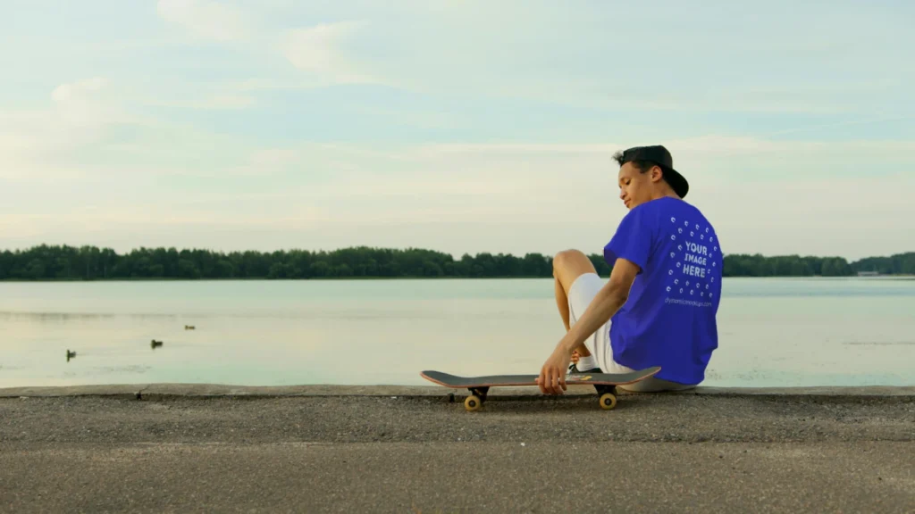 Man Wearing Blue T-shirt Mockup Front View Template