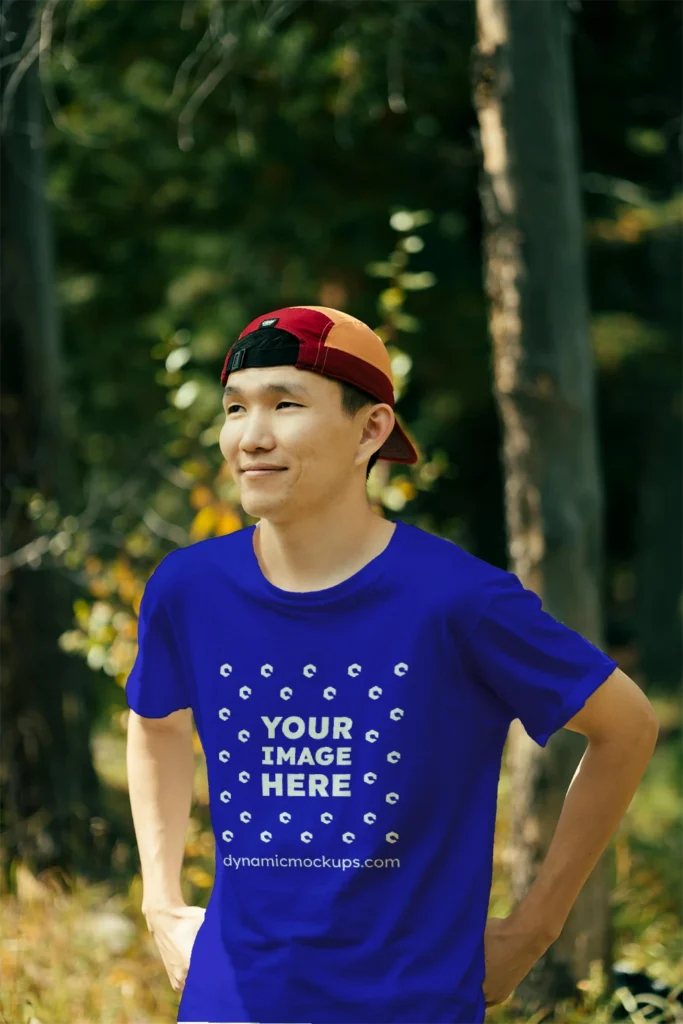 Man Wearing Blue T-shirt Mockup Front View Template