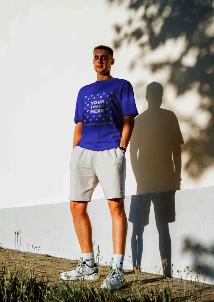 Man Wearing Blue T-shirt Mockup Front View Template