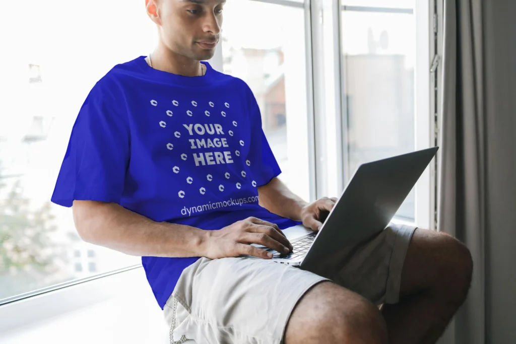 Man Wearing Blue T-shirt Mockup Front View Template