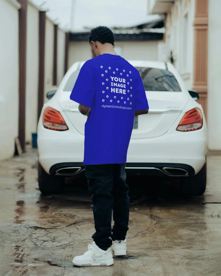 Man Wearing Blue T-shirt Mockup Back View Template