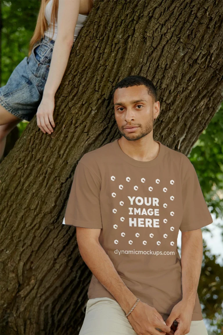 Man Wearing Brown T-shirt Mockup Front View Template