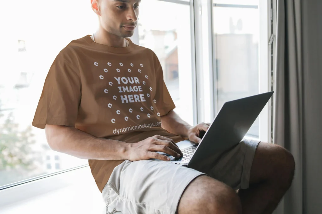 Man Wearing Brown T-shirt Mockup Front View Template