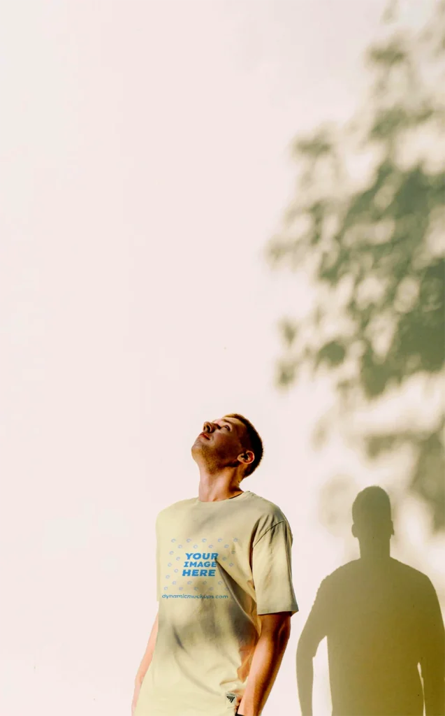 Man Wearing Cream T-shirt Mockup Front View Template