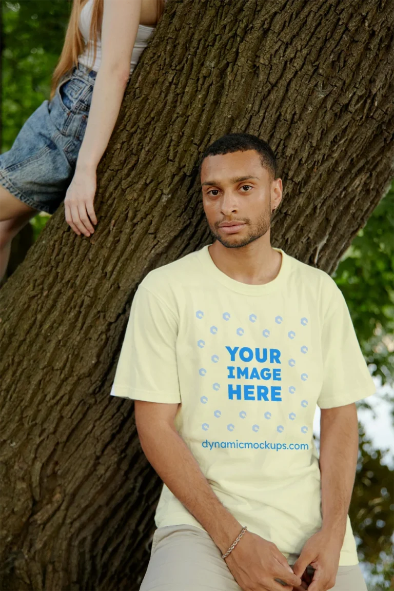 Man Wearing Cream T-shirt Mockup Front View Template