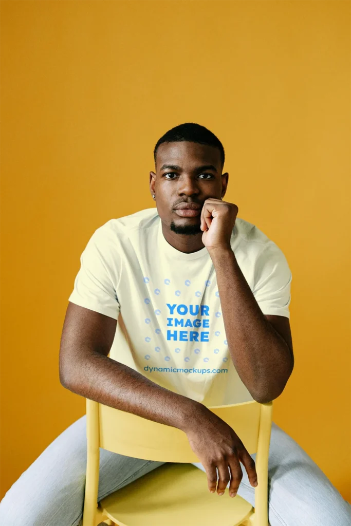 Man Wearing Cream T-shirt Mockup Front View Template